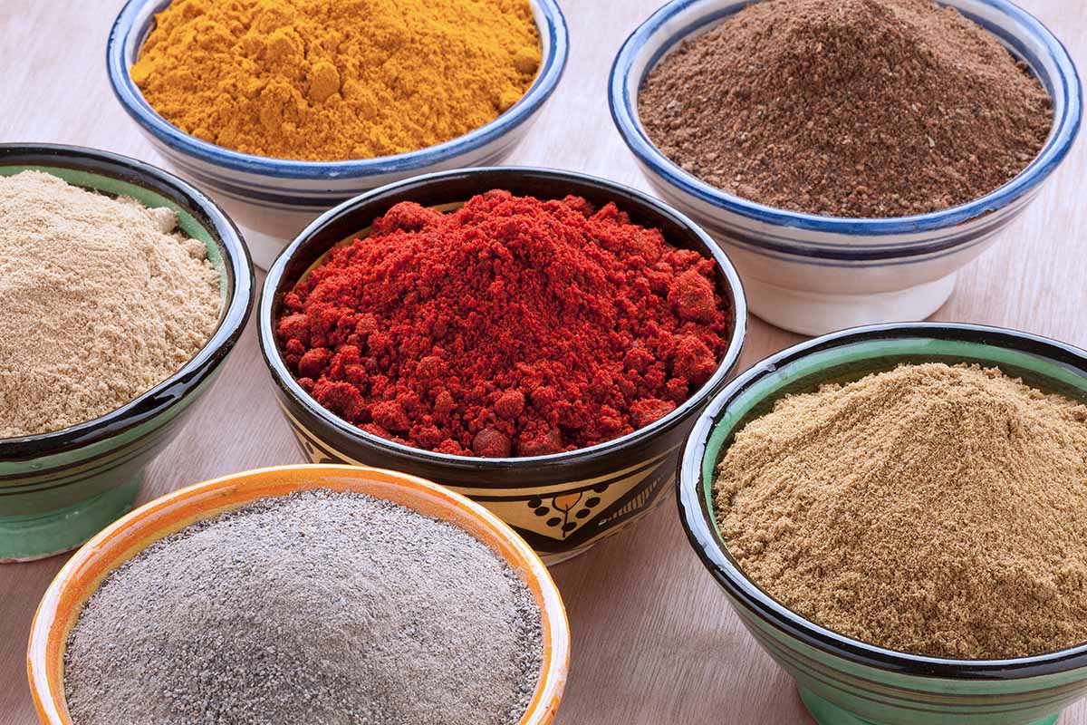 various ground spices in bowls