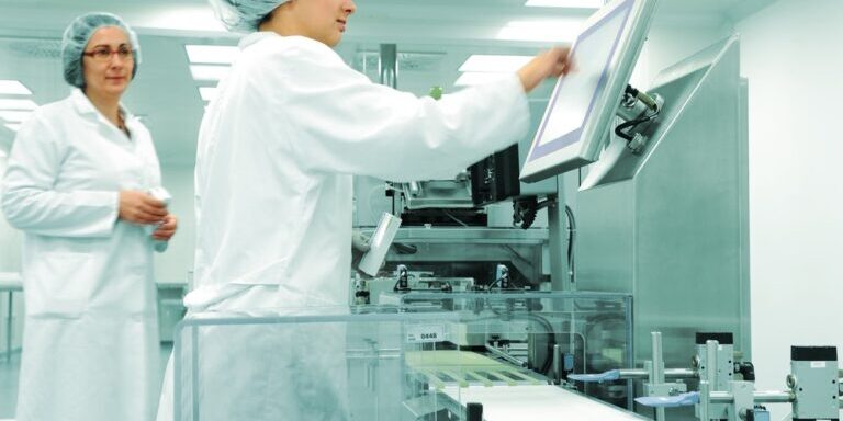 Working-people-at-production-line-in-modern-factory-1 Working-people-at-production-line-in-modern-factory-1